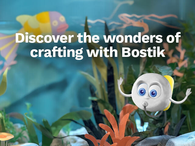 Cute blue and yellow clay fish with wide eyes swimming in an underwater craft scene with colourful plants, alongside the text “Discover the wonders of crafting with Bostik.”
