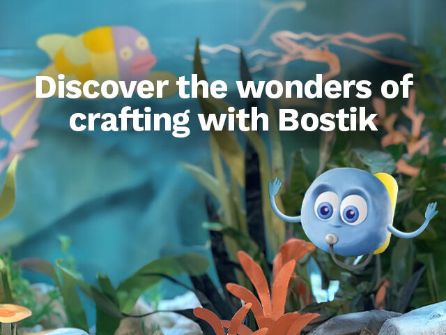 Cute blue and yellow clay fish with wide eyes swimming in an underwater craft scene with colourful plants, alongside the text “Discover the wonders of crafting with Bostik.”