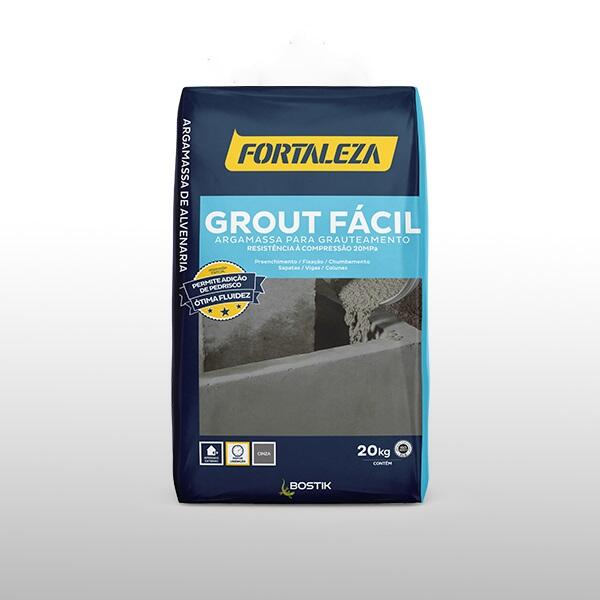 Saco de Grout Fácil Fortaleza 20 MPa para grauteamento estrutural, mostrando aplicação em alvenaria com fluidez e resistência confiáveis.