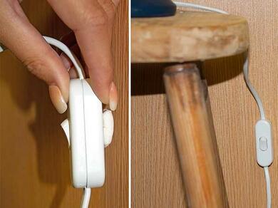Using Bostik Prestik to fix a light switch to a wooden surface, with a close-up of cable neatly secured