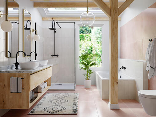 Modern bathroom with double sink and bathtub, white tiles, towel on wall, ideal for sealing with Bostik products.