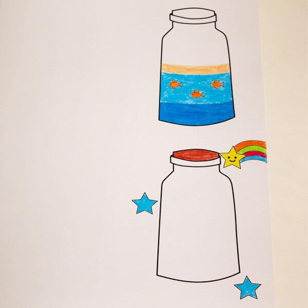 Two sheets with jar illustrations, one coloured with fish and water, the other left blank for layering fun.