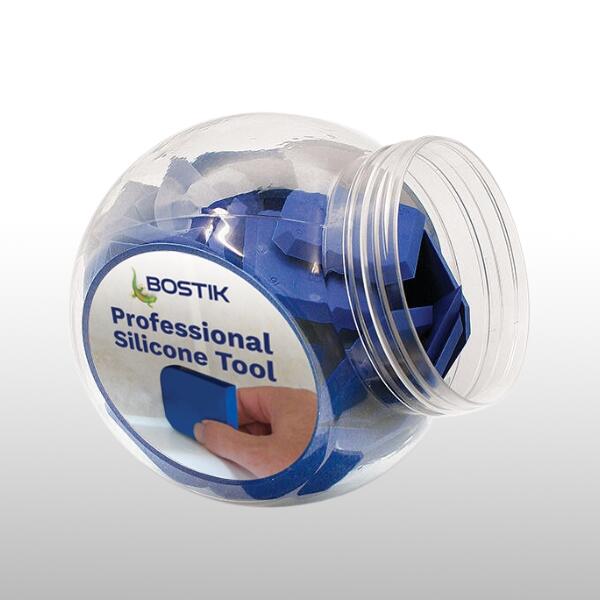 Transparent round container filled with blue Bostik Professional Silicone Tools, showing a label with the Bostik logo and a photo of the tool in use for smoothing silicone sealant.
