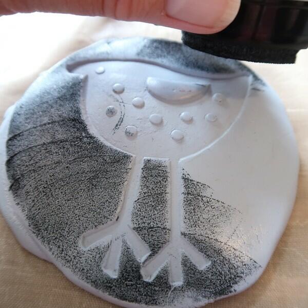 Use an ink pad or sponge to colour your Blu Tack® circle pattern.