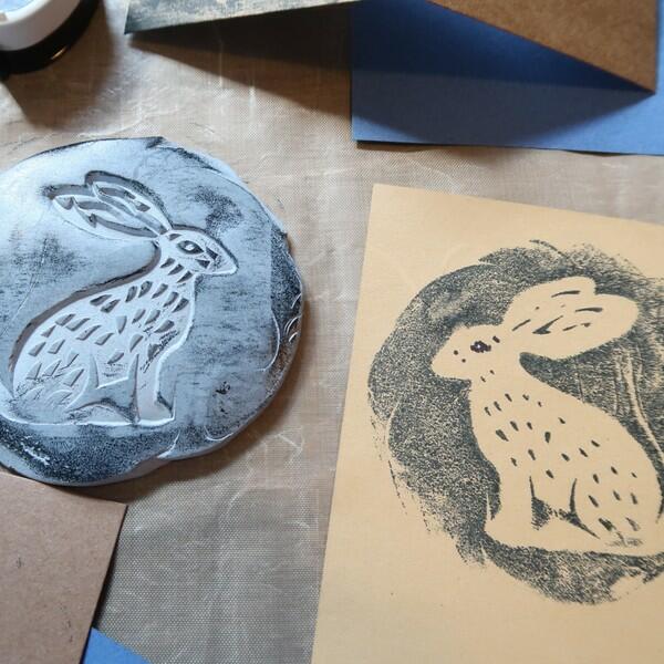 Detailed clay impression of a hare stamp showing textured fur and long ears.