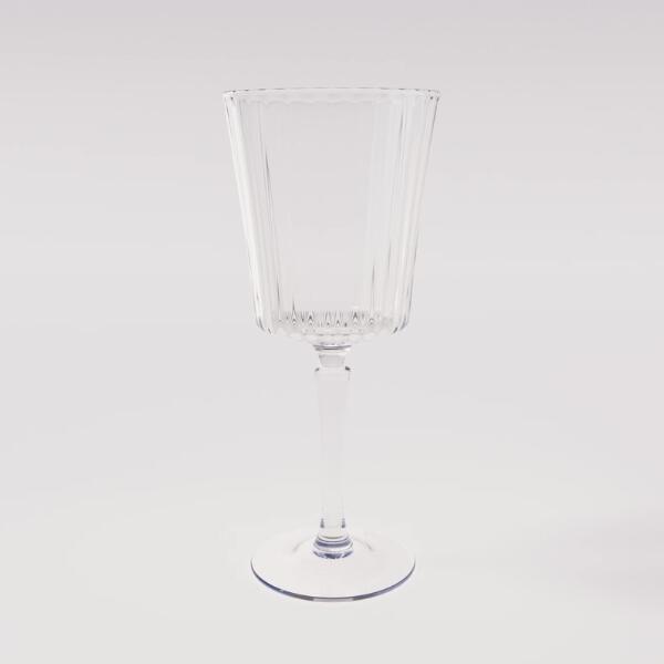 Crystal wine glass standing upright after successful repair with no visible damage
