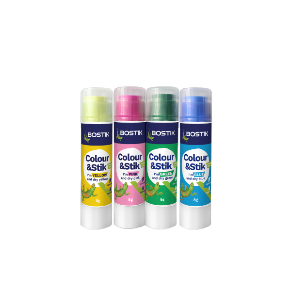 Four Bostik Colour & Stik glue sticks in yellow, pink, green, and blue, standing upright with labels facing forward.