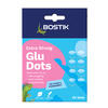 Front view of Bostik Glu Dots Extra Strong 64-pack in blue and pink packaging, labelled clear and permanent, ideal for gift wrapping, card making, and scrapbooking.